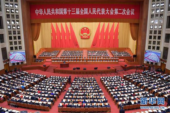 3月12日，十三届全国人大二次会议在北京人民大会堂举行第三次全体会议。 新华社记者 李涛 摄